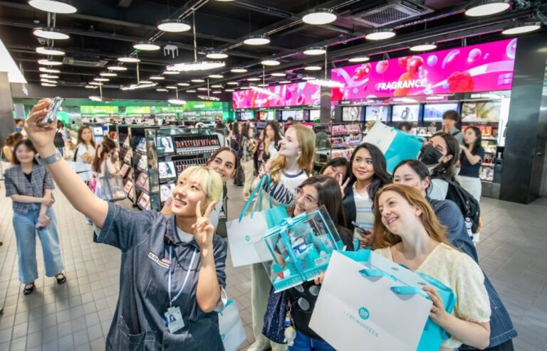 Tourists enjoying Olive Young's K-beauty docent tour in Myeongdong Seoul Korea