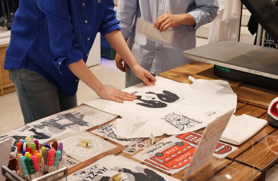 Stamping unique dog t-shirts in Hazzy's store in Myeongdong, Seoul, South Korea