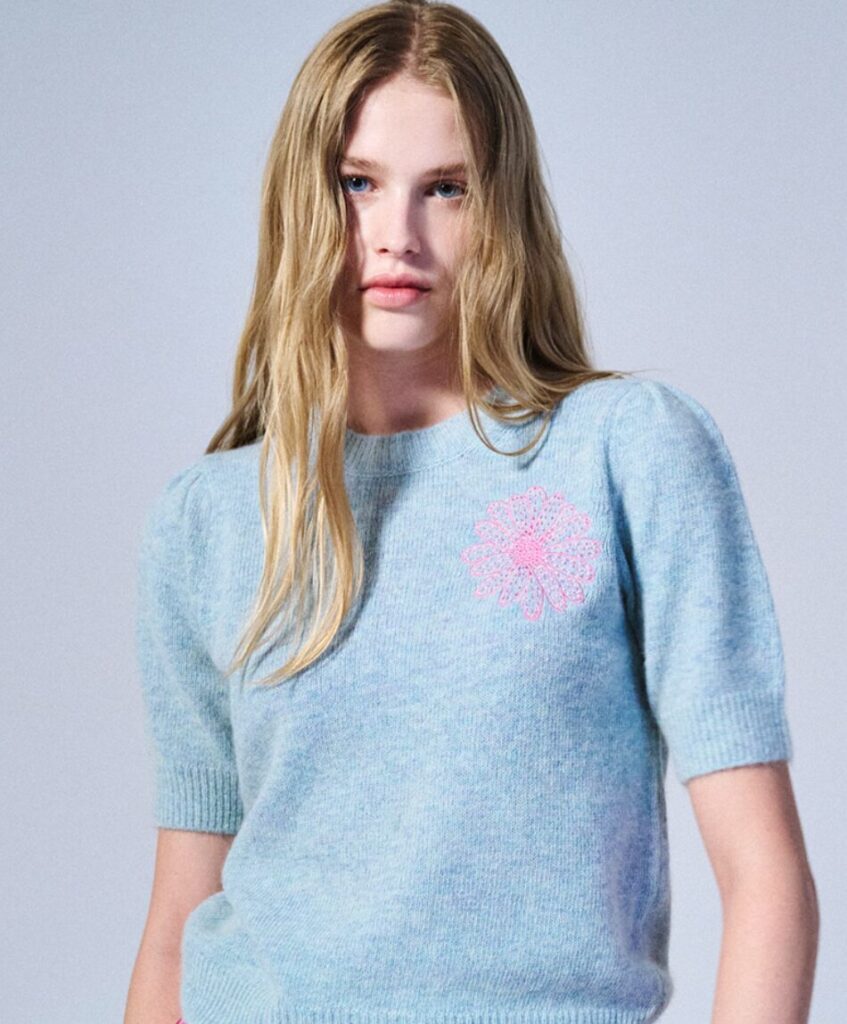 A female model wearing a Mardi Mercredi Mint knitted top from My Sweet Mobster Episode 1