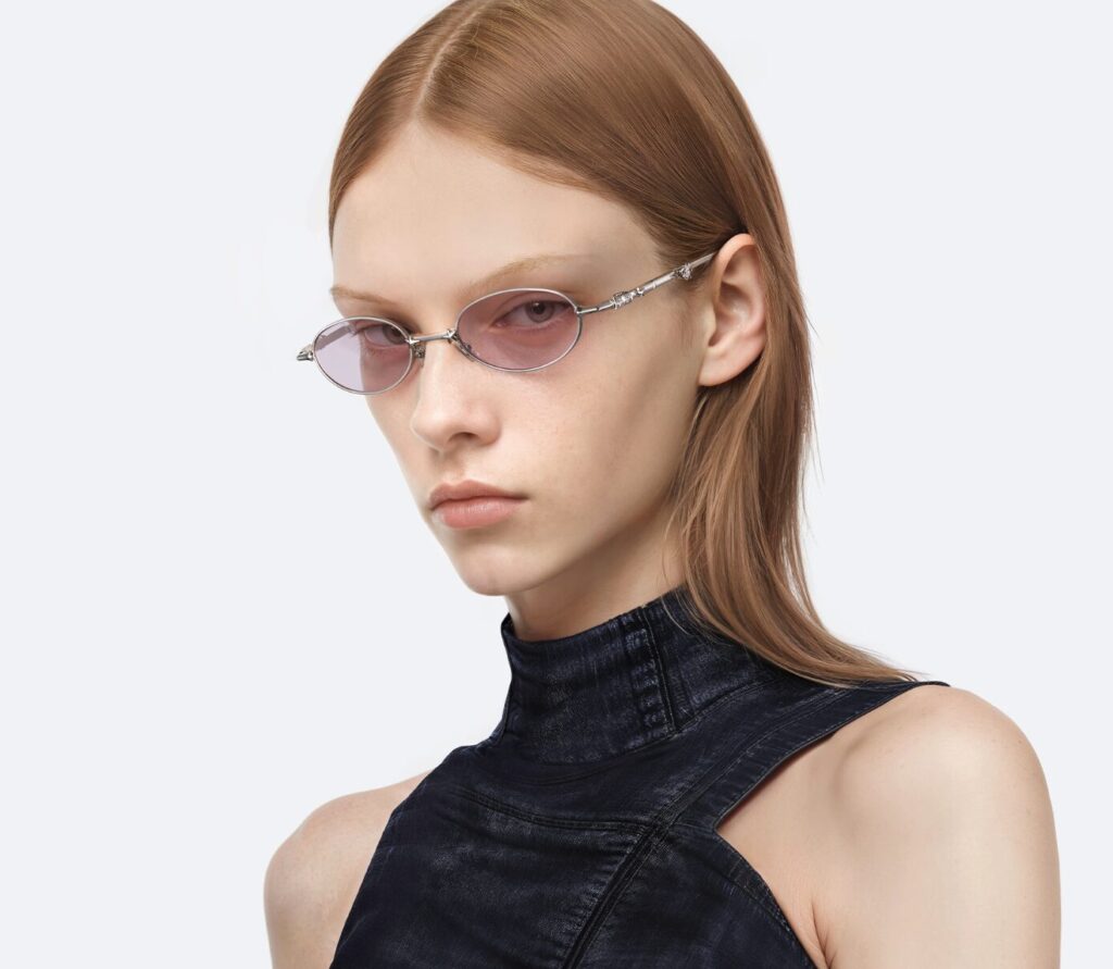 A female model wearing Gentle Monster Bratz Folderable Sunglasses