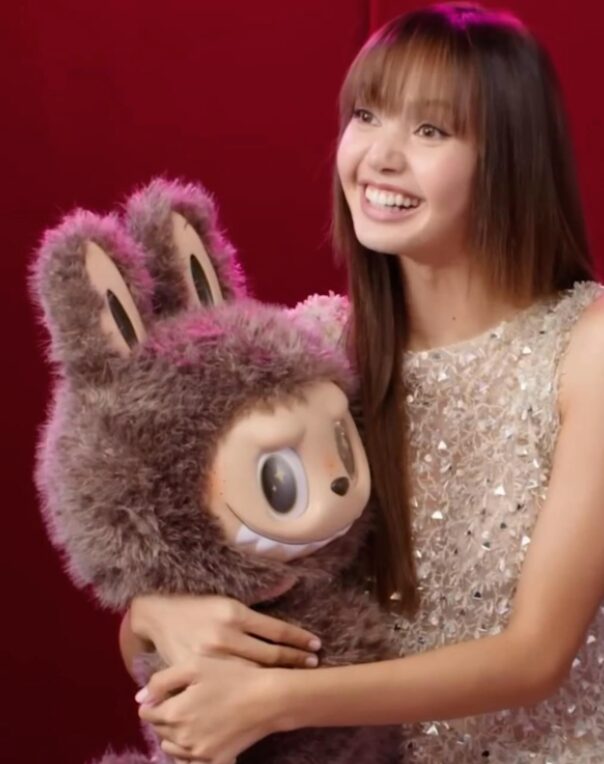 BLACK PINK Lisa holding a huge Labubu doll